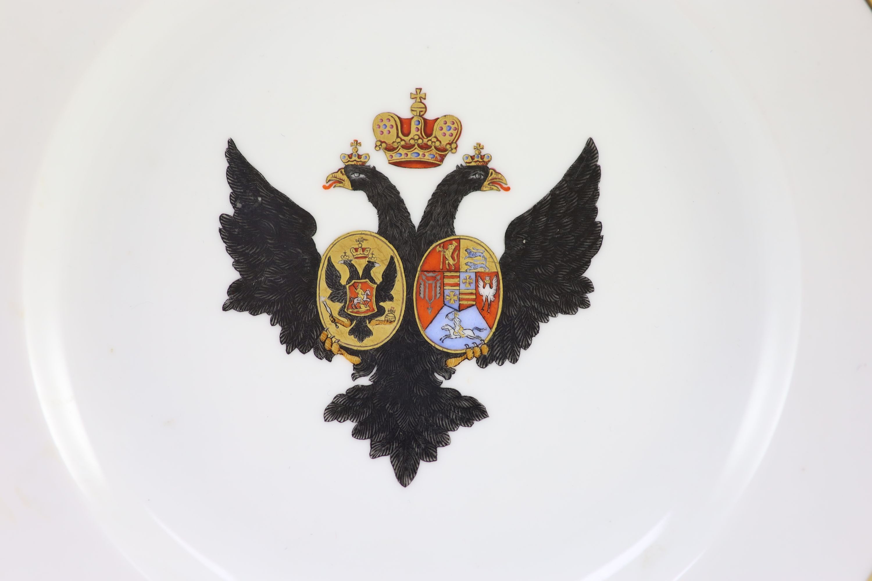 A Russian porcelain armorial plate, Imperial Porcelain Factory, St. Petersburg, Period of Alexander II, (ruled 1856-81), 24.8 cm diameter